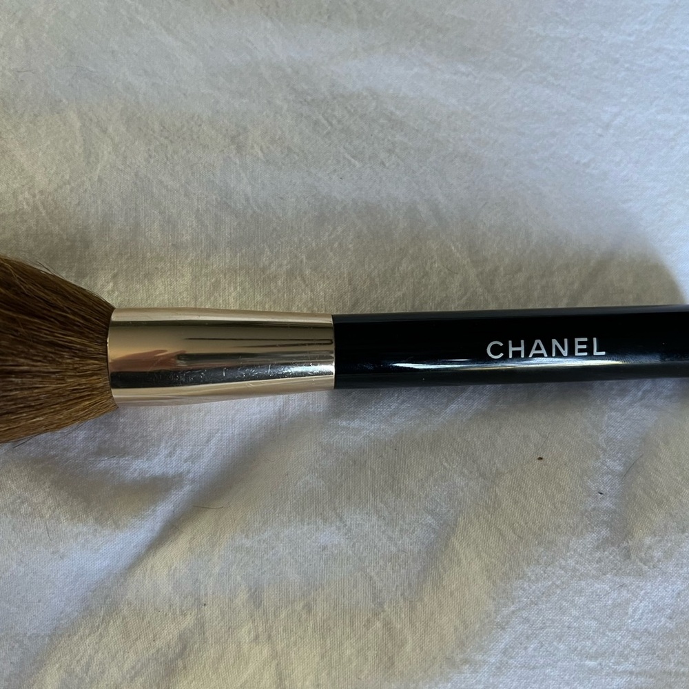 CHANEL Black and Gold Powder Brush (Discontinued) From the early 2000s.